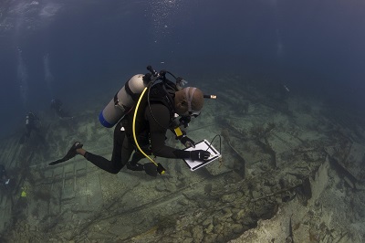 A DWP diver surveys the Hannah M. Bell shipwreck on Elbow Reef, Key Largo, Florida. Credit: Diving with a Purpose.